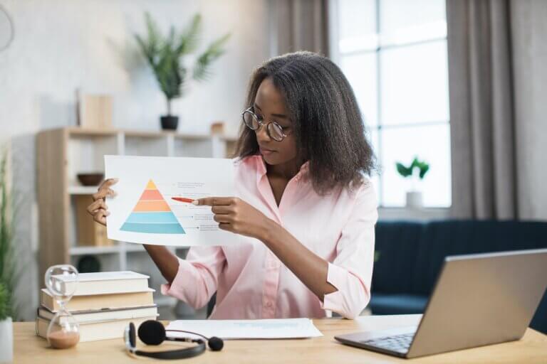 African female teacher leading video lesson from home